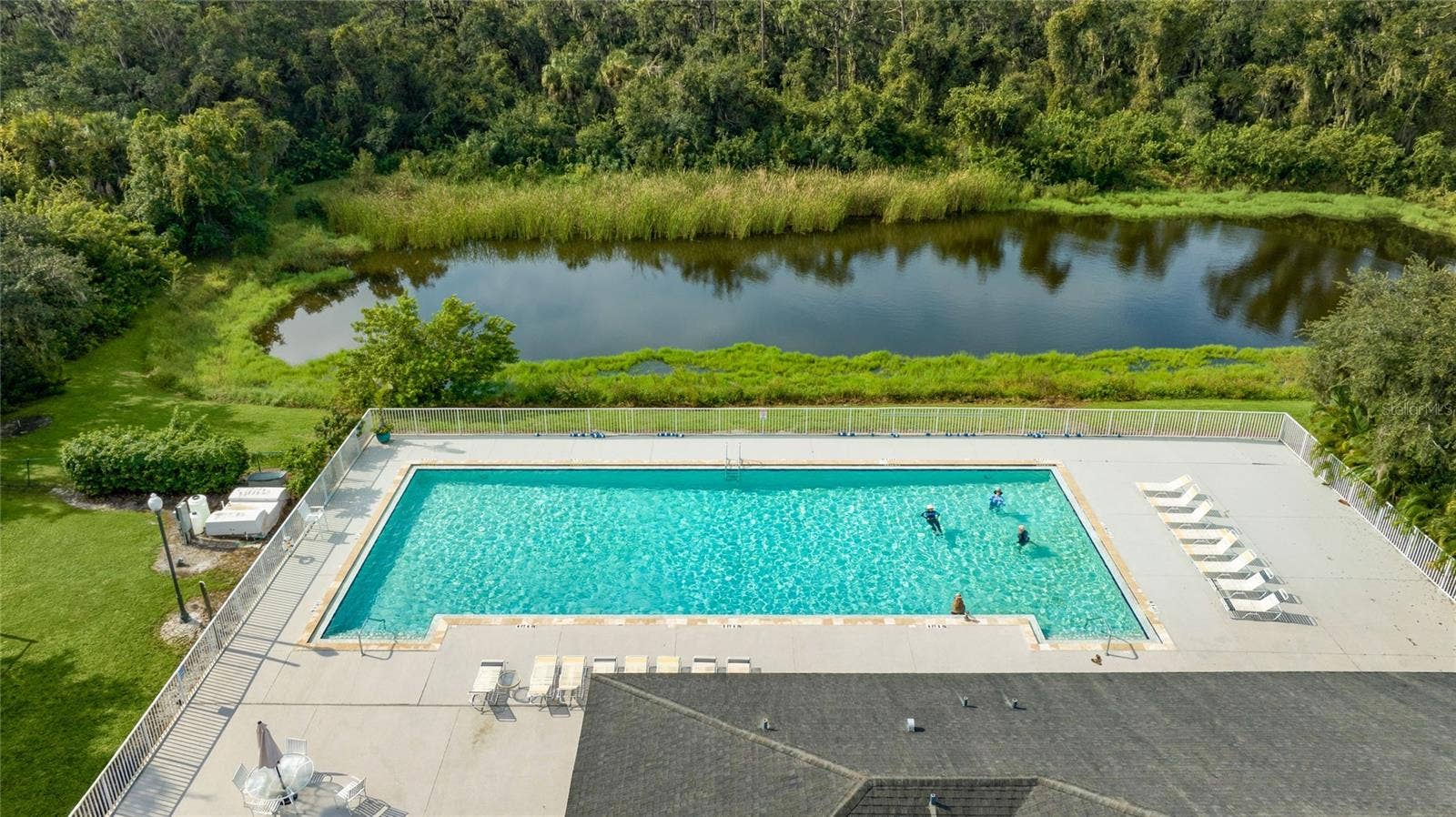 3306 LITTLE COUNTRY ROAD, Parrish, FL 34219 The club at River Wilderness features a Junior Olympic-size pool.