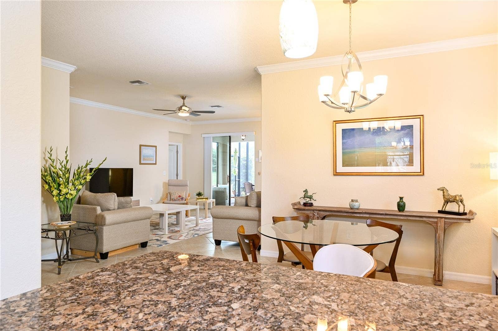 7124 MARSH VIEW TERRACE STREET, Bradenton, FL 34212 View of Great Room and lanai acces from Kitchen and dining area