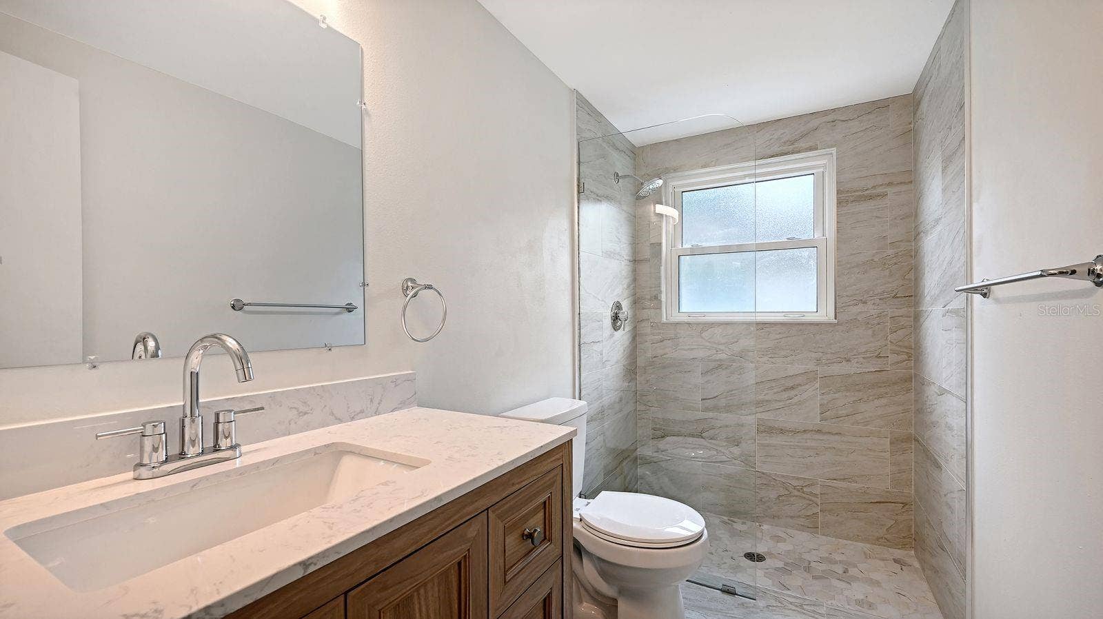 Unstaged Guest Bathroom completely remodeled