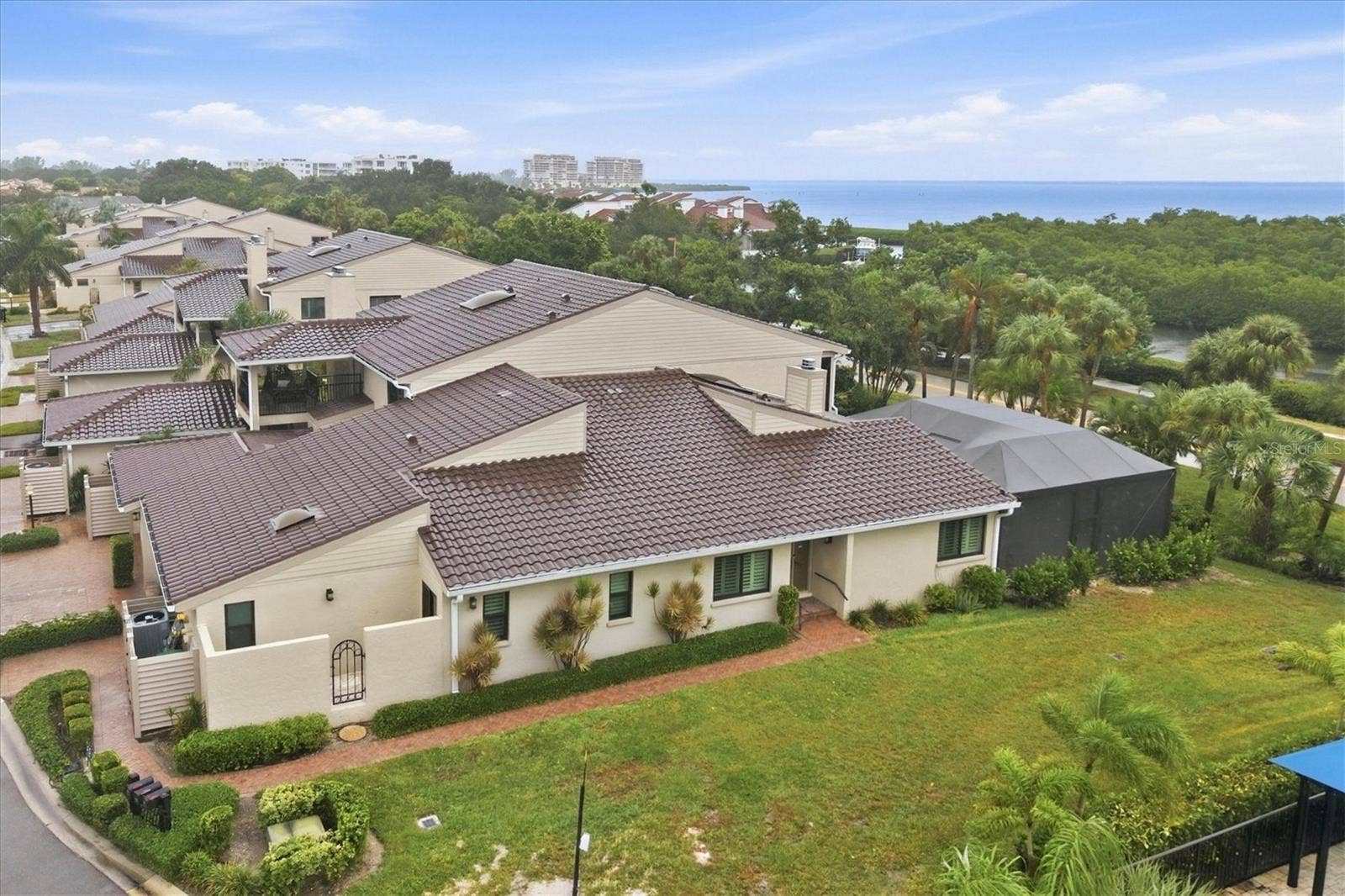 2141 HARBOURSIDE DRIVE, #1203, Longboat Key, FL 34228 End unit with yard space close access to community pool