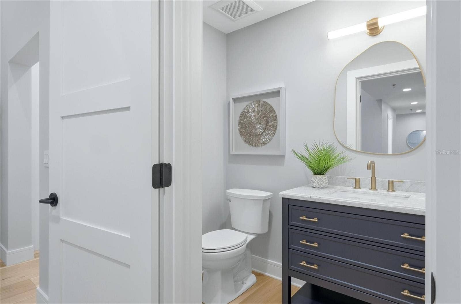 2141 HARBOURSIDE DRIVE, #1203, Longboat Key, FL 34228 Half Bath with Carrera Marble Vanity