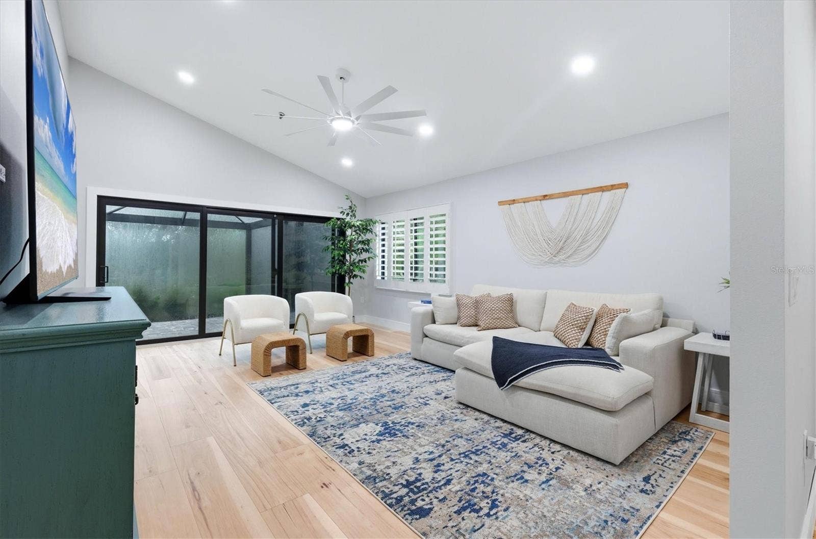 2141 HARBOURSIDE DRIVE, #1203, Longboat Key, FL 34228 Living room to large screened lanai with new stone pavers