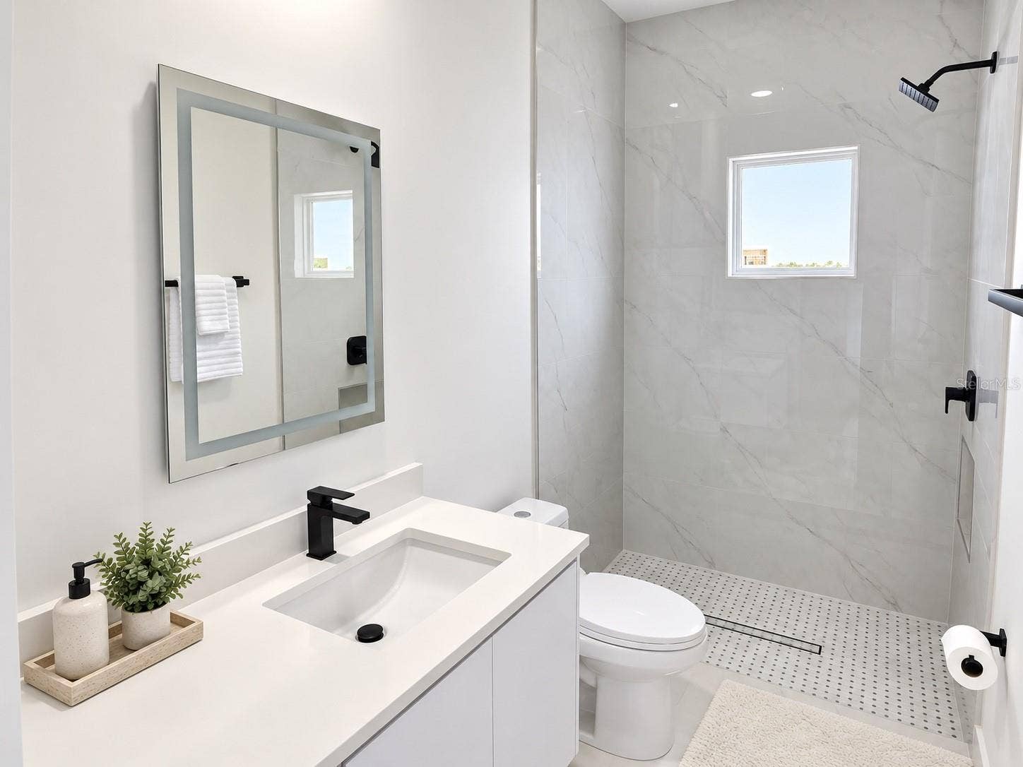 3126 BELLEVILLE TER, North Port, FL 34286 Additional bathroom with a vanity and walk-in shower.