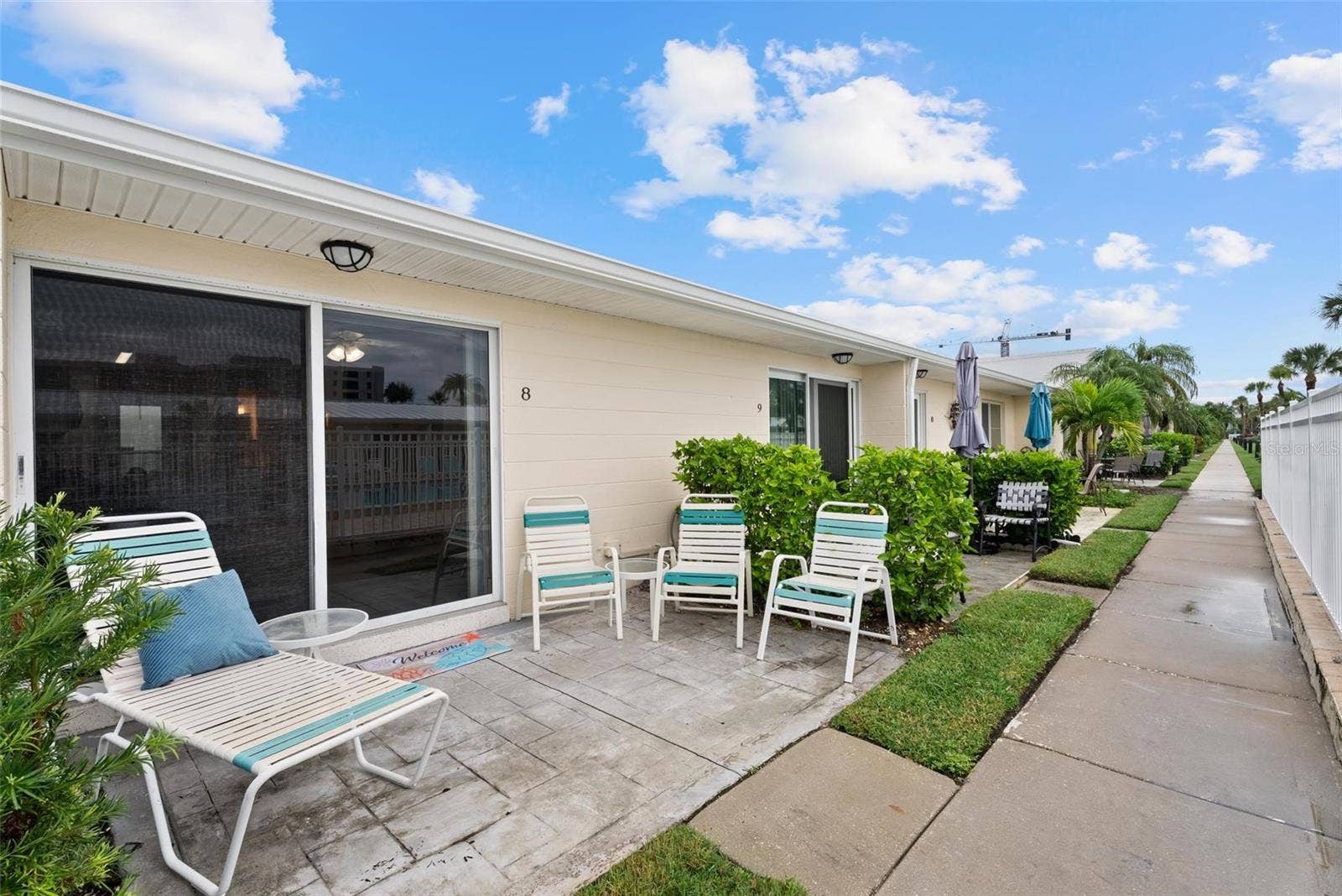 5830 MIDNIGHT PASS ROAD, #8, Sarasota, FL 34242 Back patio is upgraded with pavers