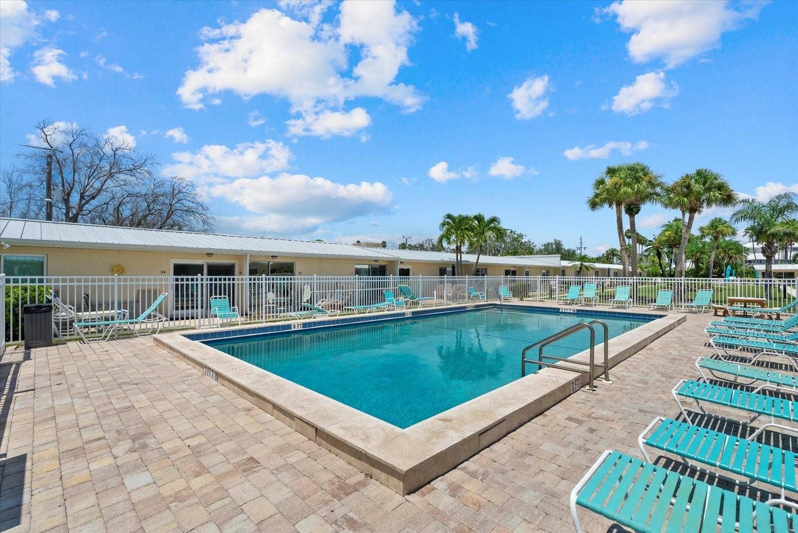 5830 MIDNIGHT PASS ROAD, #8, Sarasota, FL 34242 Pool 1 is located towards the front of the property