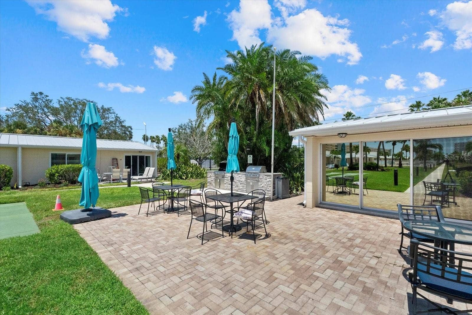 5830 MIDNIGHT PASS ROAD, #8, Sarasota, FL 34242 One of the outdoor grilling areas