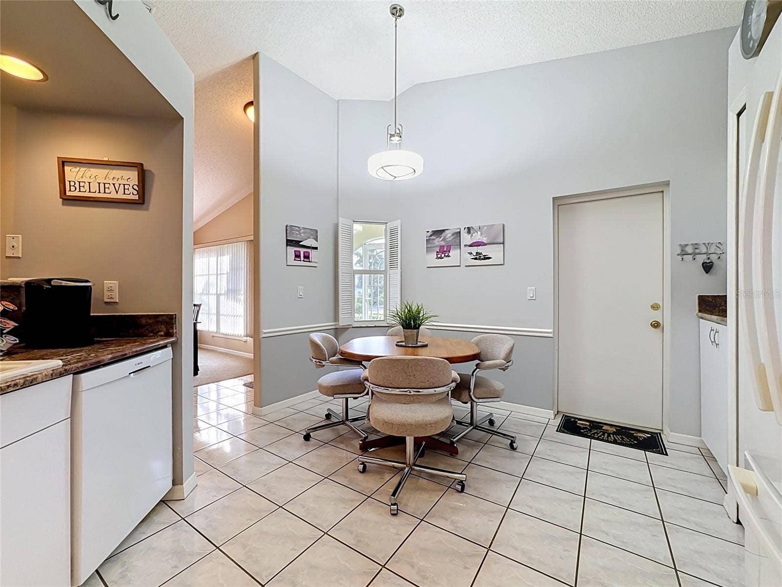 Kitchen with door to garage