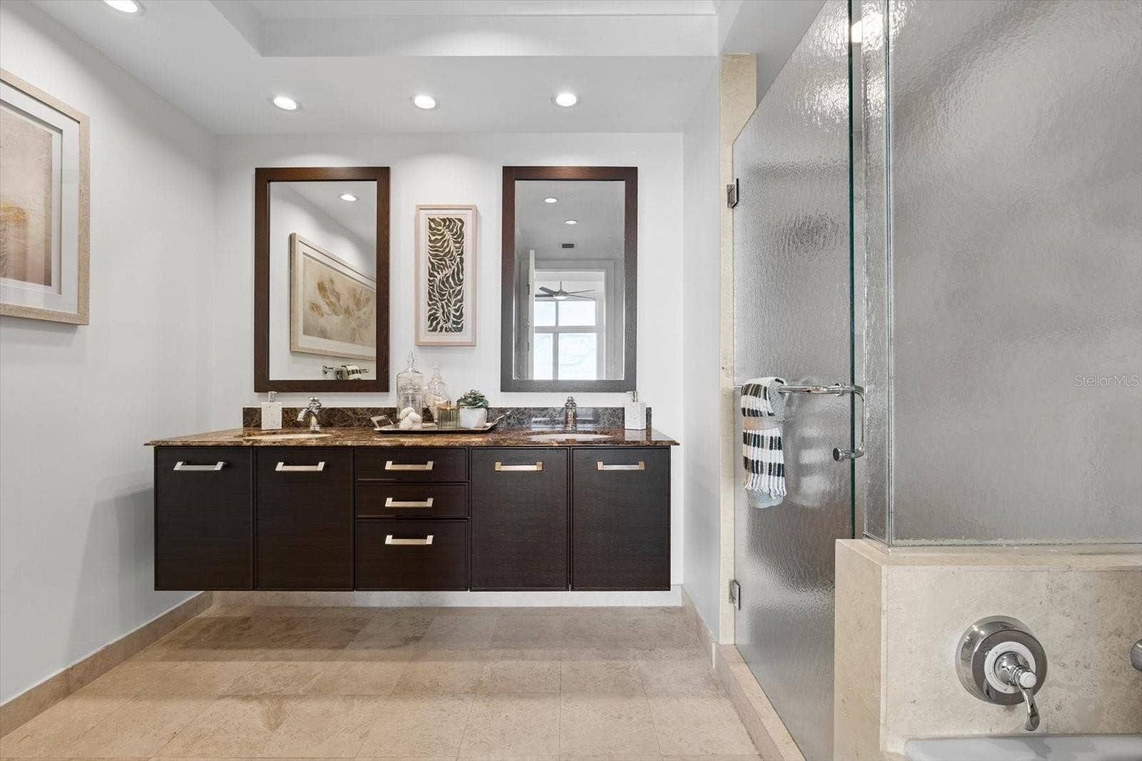 1350 MAIN STREET, #1703, Sarasota, FL 34236 Primary bathroom with stone counters & dal sinks