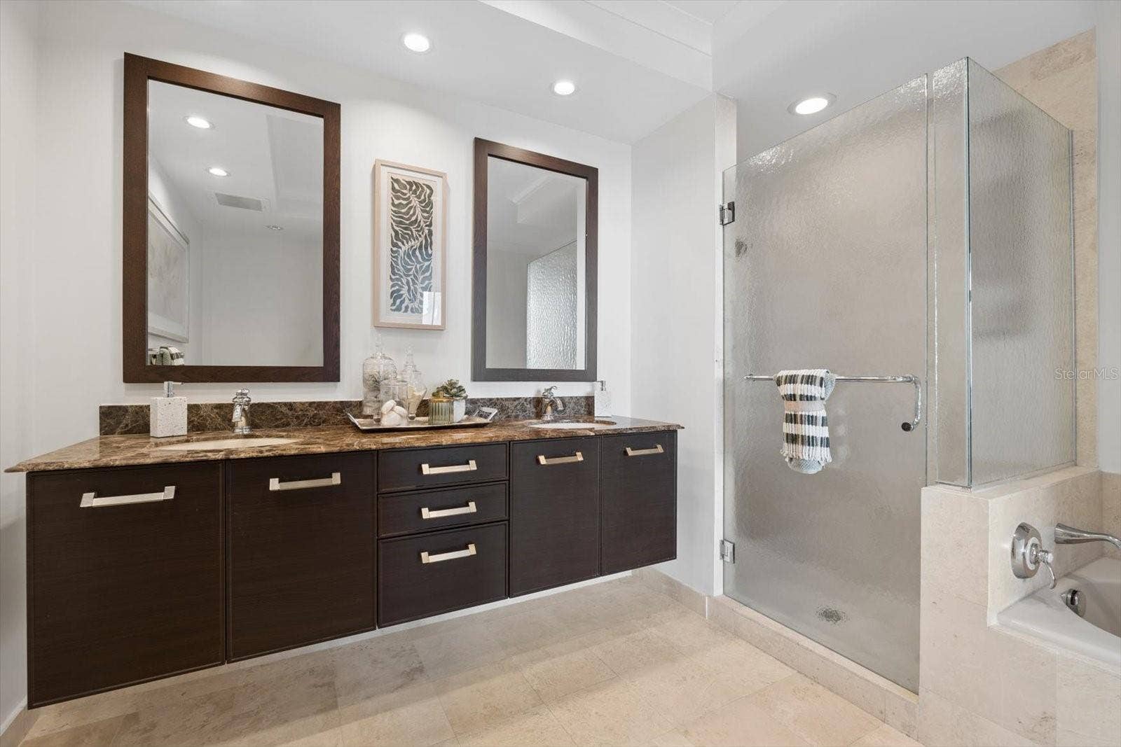 1350 MAIN STREET, #1703, Sarasota, FL 34236 Primary bathroom with stone counters & dal sinks