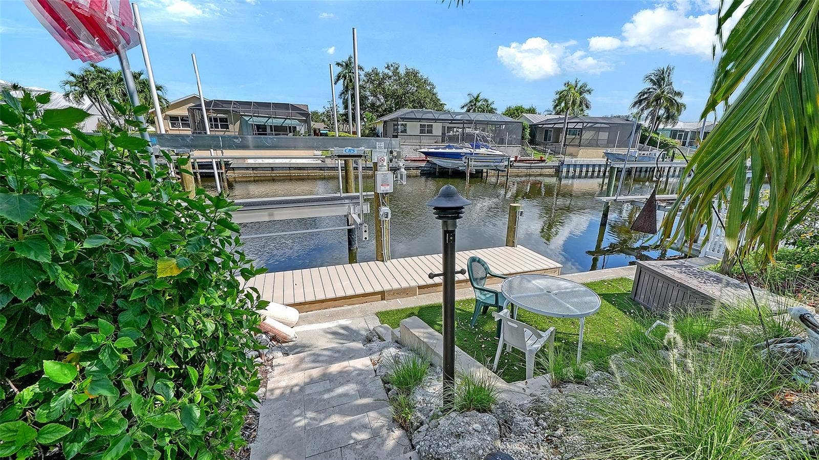 4907 CORAL BOULEVARD, Bradenton, FL 34210 A quiet waterside spot for coffee and canal views.