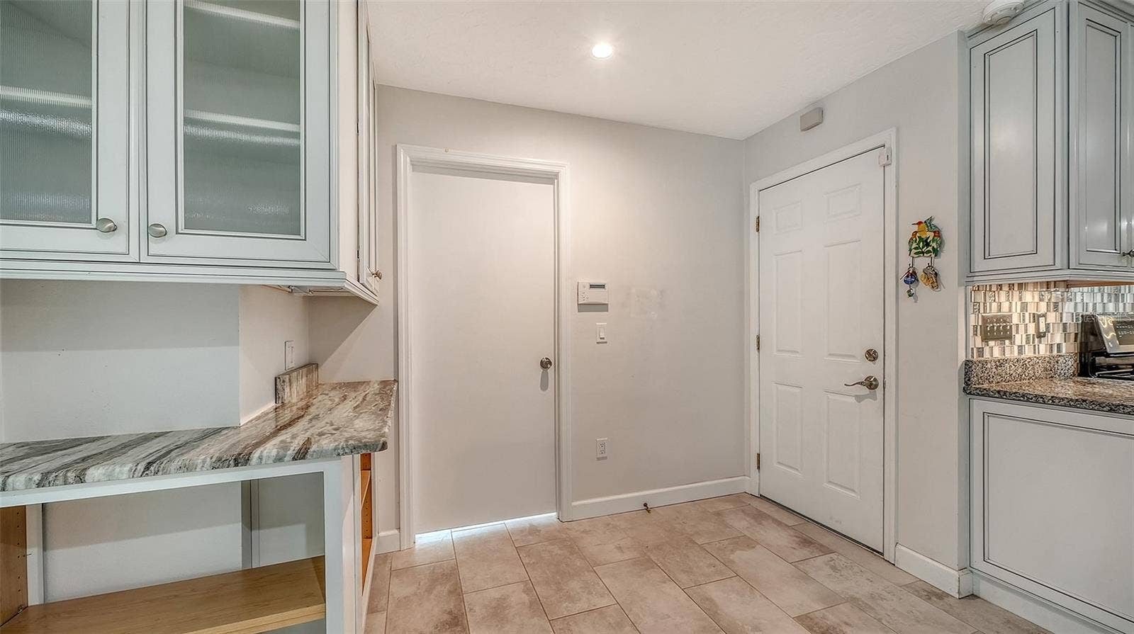 4907 CORAL BOULEVARD, Bradenton, FL 34210 Additional kitchen storage keeps essentials close at hand.