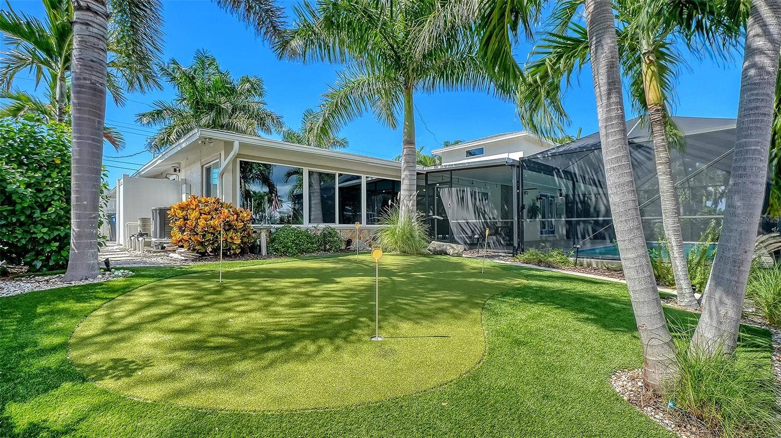 4907 CORAL BOULEVARD, Bradenton, FL 34210 A backyard putting green adds another way to enjoy the outdoors.