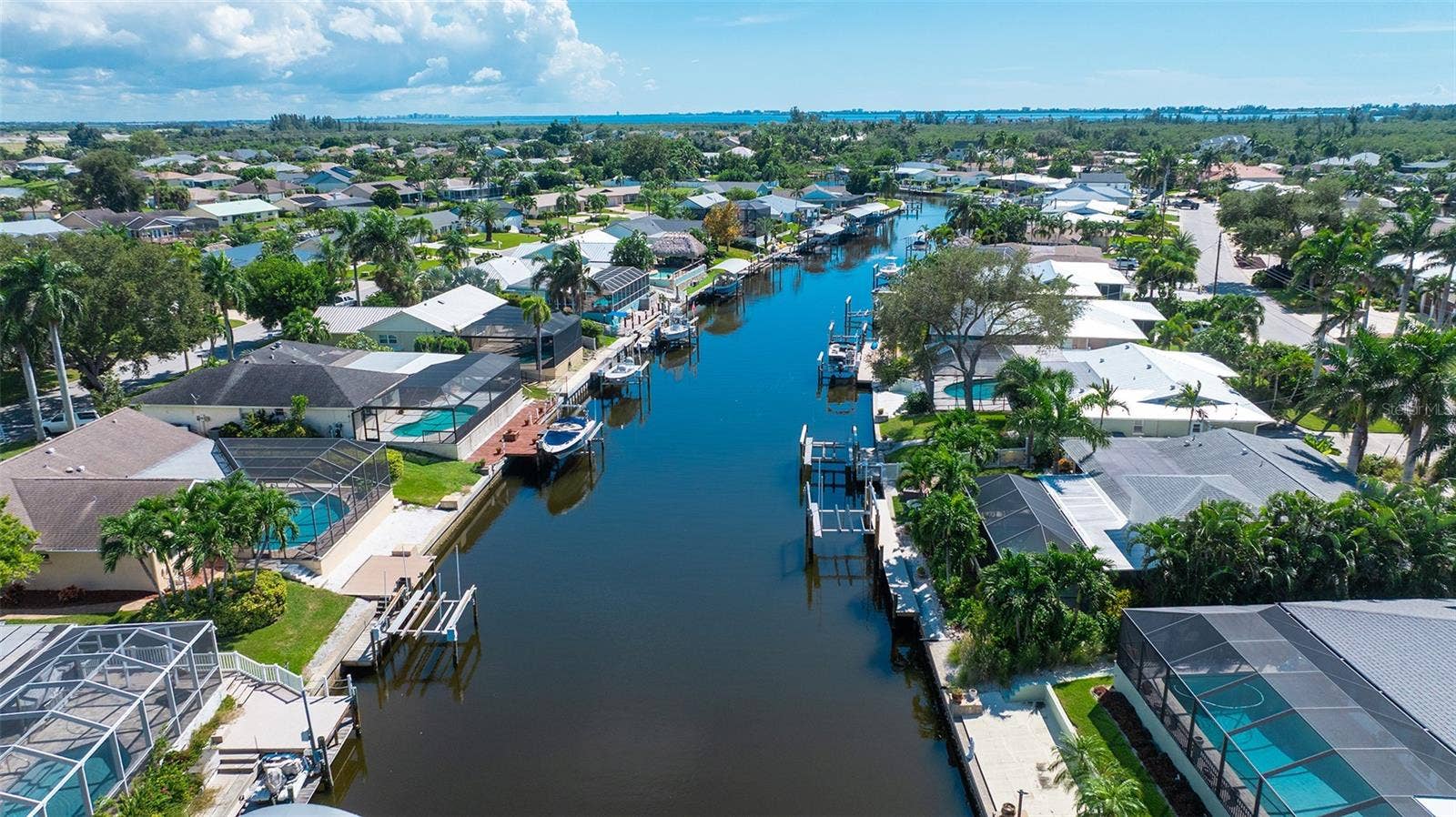 4907 CORAL BOULEVARD, Bradenton, FL 34210 A broad canal view puts the waterfront lifestyle in perspective.