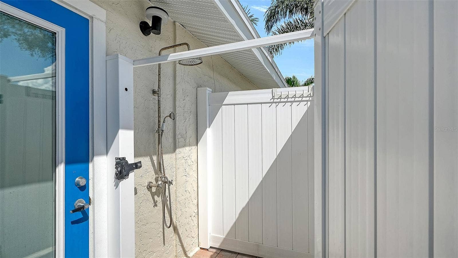 4907 CORAL BOULEVARD, Bradenton, FL 34210 An outdoor shower offers a convenient rinse after pool time.