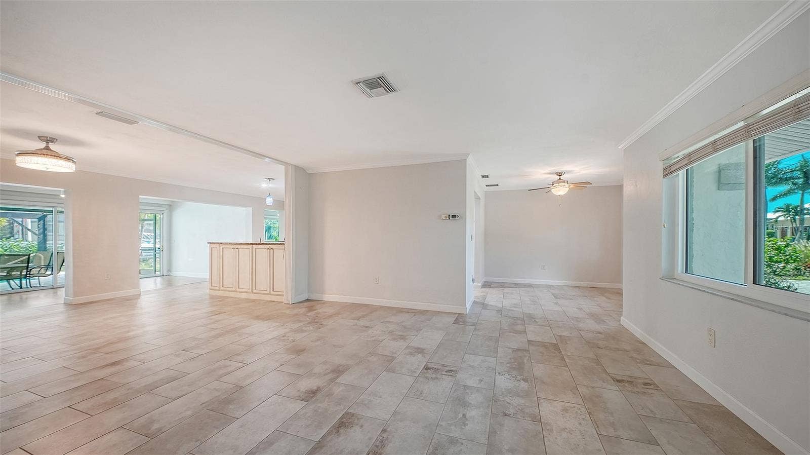 4907 CORAL BOULEVARD, Bradenton, FL 34210 Connected living spaces make gathering easy.
