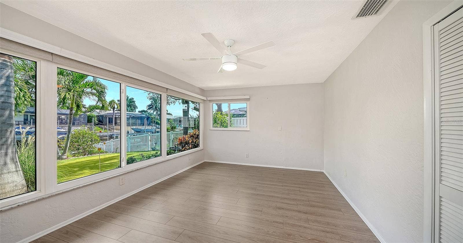 4907 CORAL BOULEVARD, Bradenton, FL 34210 Garden views create a peaceful setting for work or relaxation.