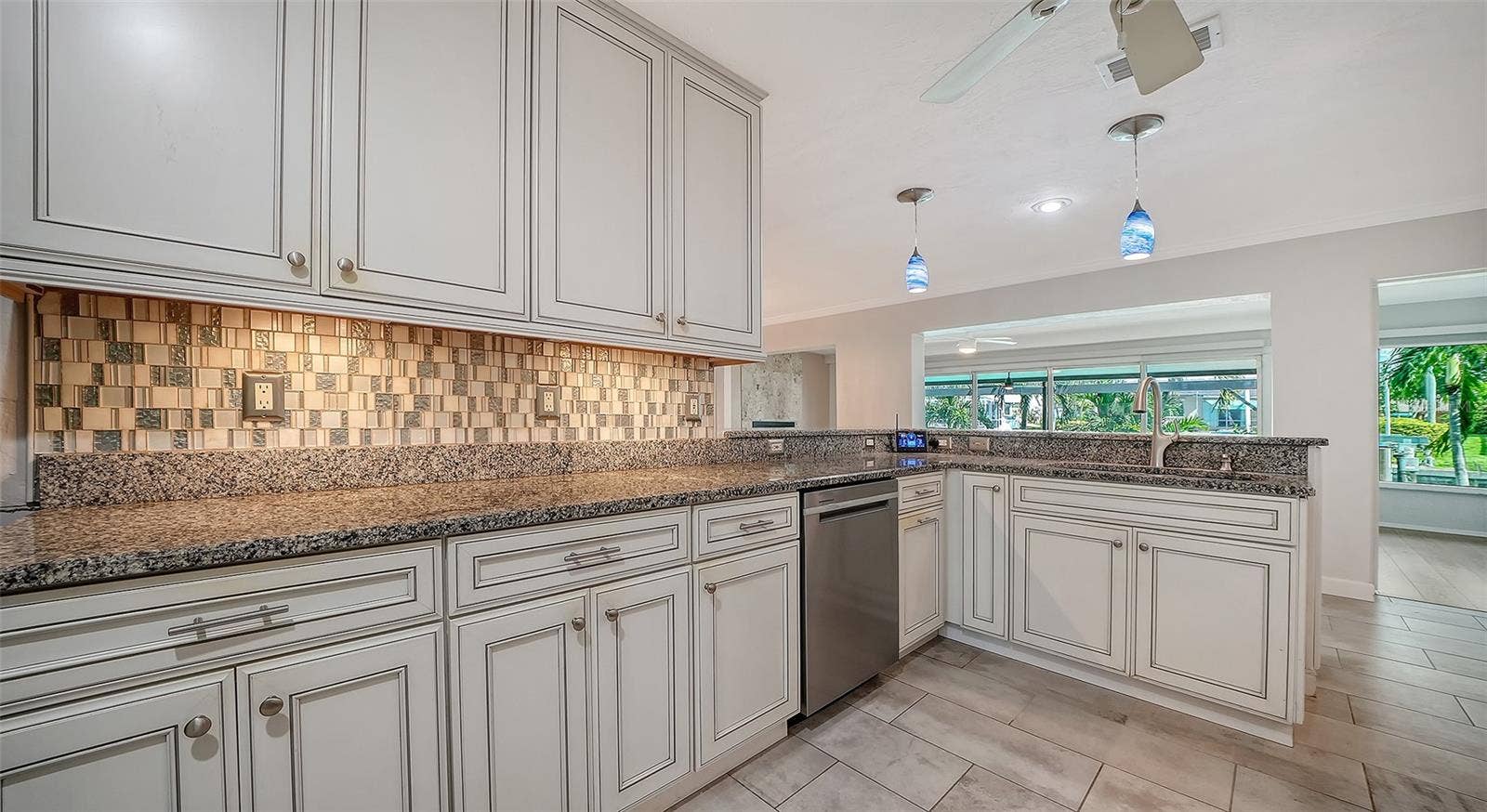 4907 CORAL BOULEVARD, Bradenton, FL 34210 Expansive counters and cabinetry keep meal preparation organized.