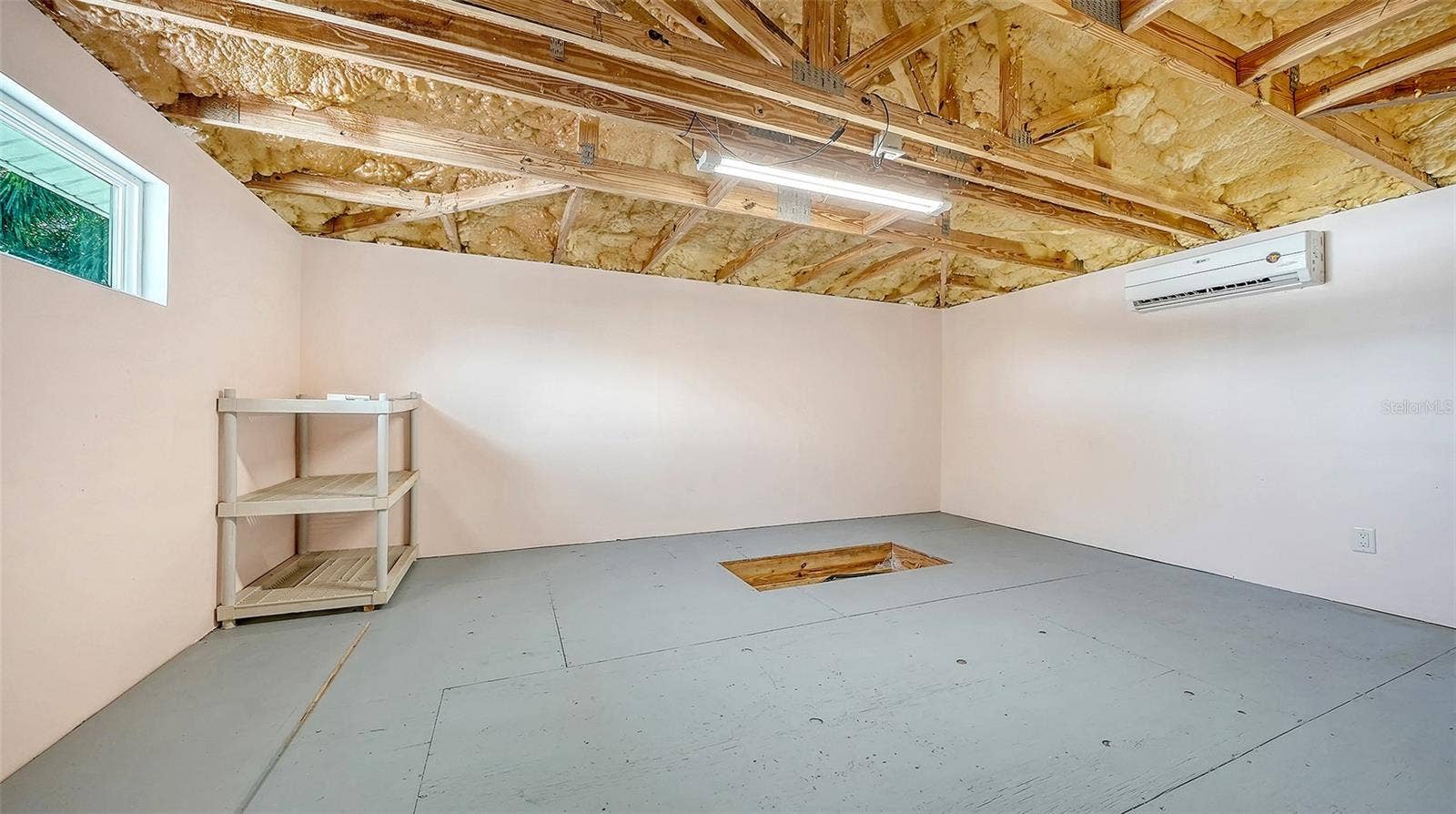 4907 CORAL BOULEVARD, Bradenton, FL 34210 Additional storage space above the living area.