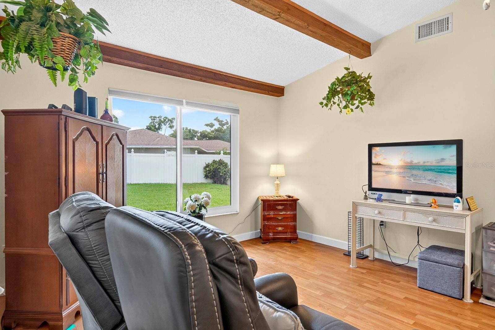 6806 21ST AVENUE TERRACE W, Bradenton, FL 34209 Family room with large window into yard