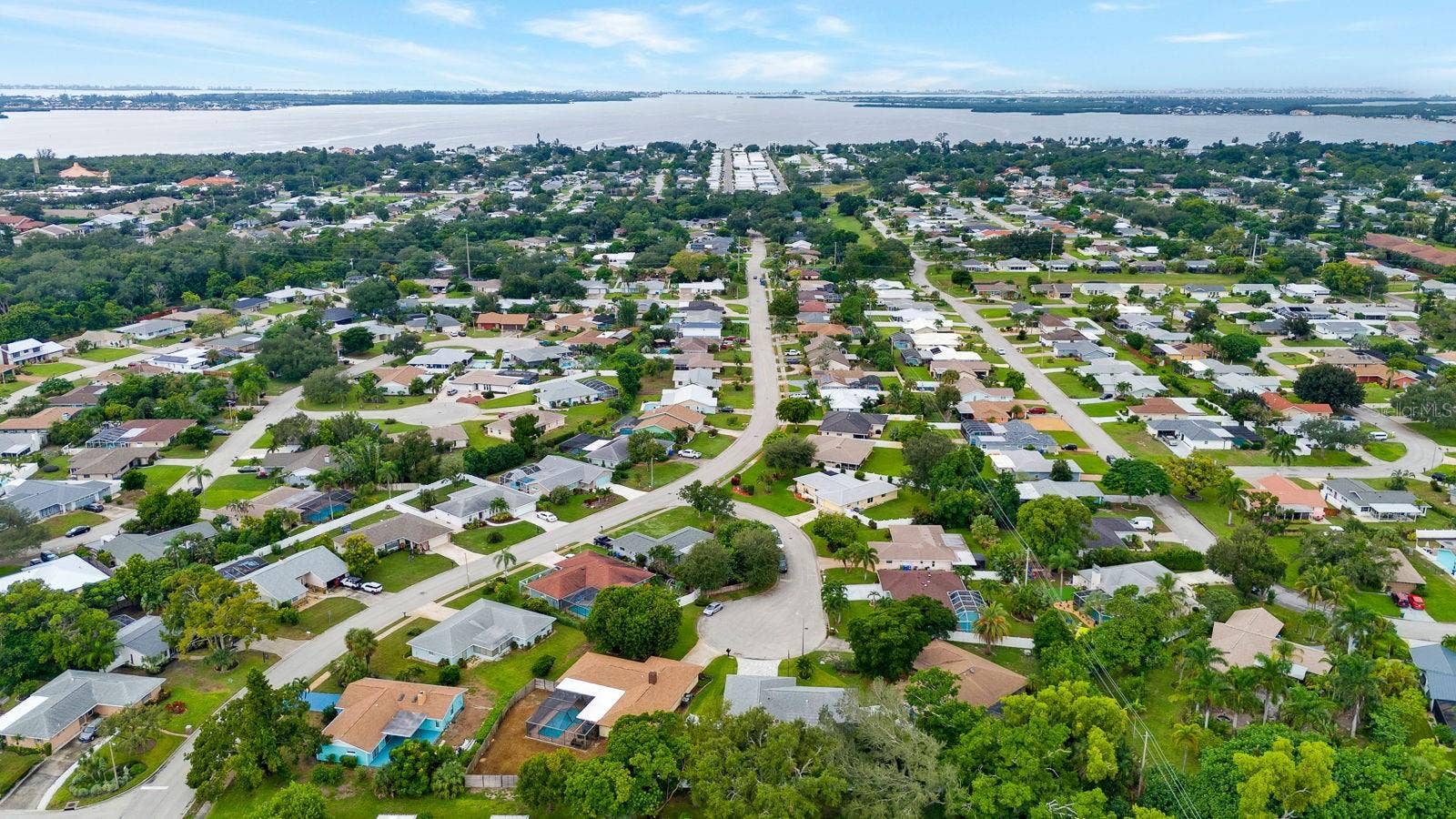 6806 21ST AVENUE TERRACE W, Bradenton, FL 34209 Aerial View of neighborhood with bay in the background