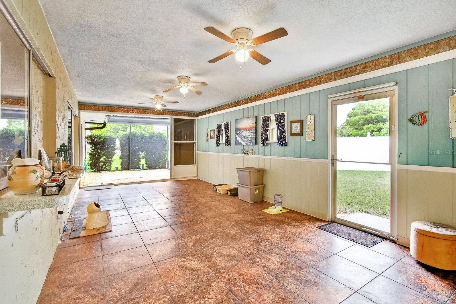 6806 21ST AVENUE TERRACE W, Bradenton, FL 34209 Large enclosed lanai with extended outdoor lanai