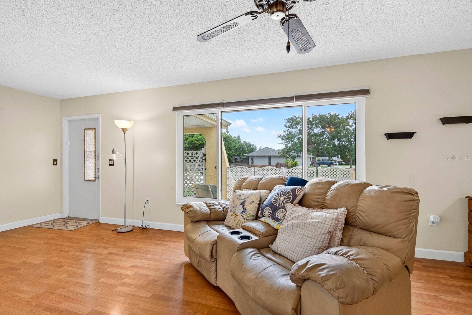 6806 21ST AVENUE TERRACE W, Bradenton, FL 34209 Living room looking out front window