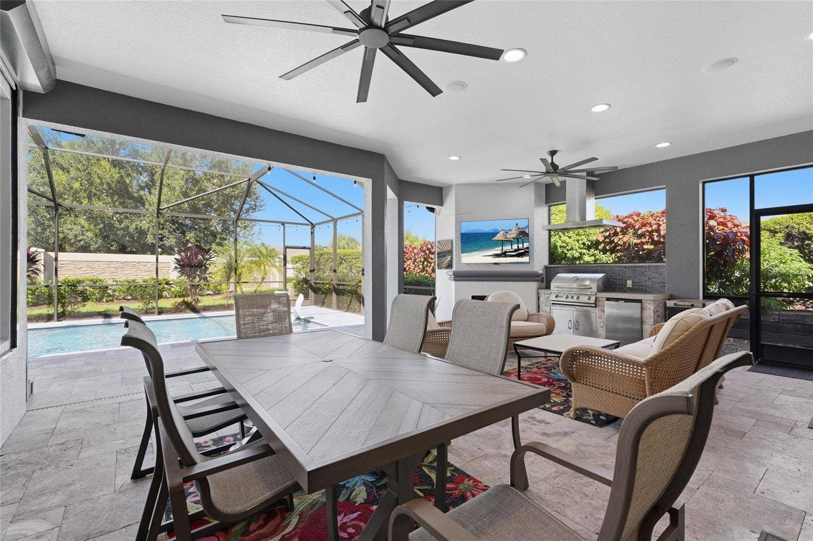 13227 PALERMO DRIVE, Bradenton, FL 34211 Outdoor lanai area with ample seating room plus outdoor kitchen