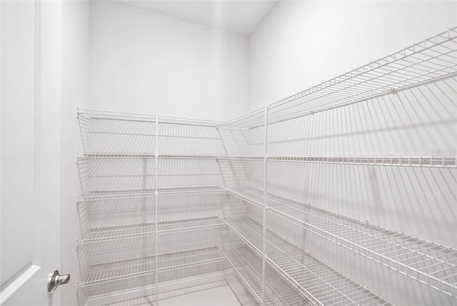 Walk in pantry virtually staged