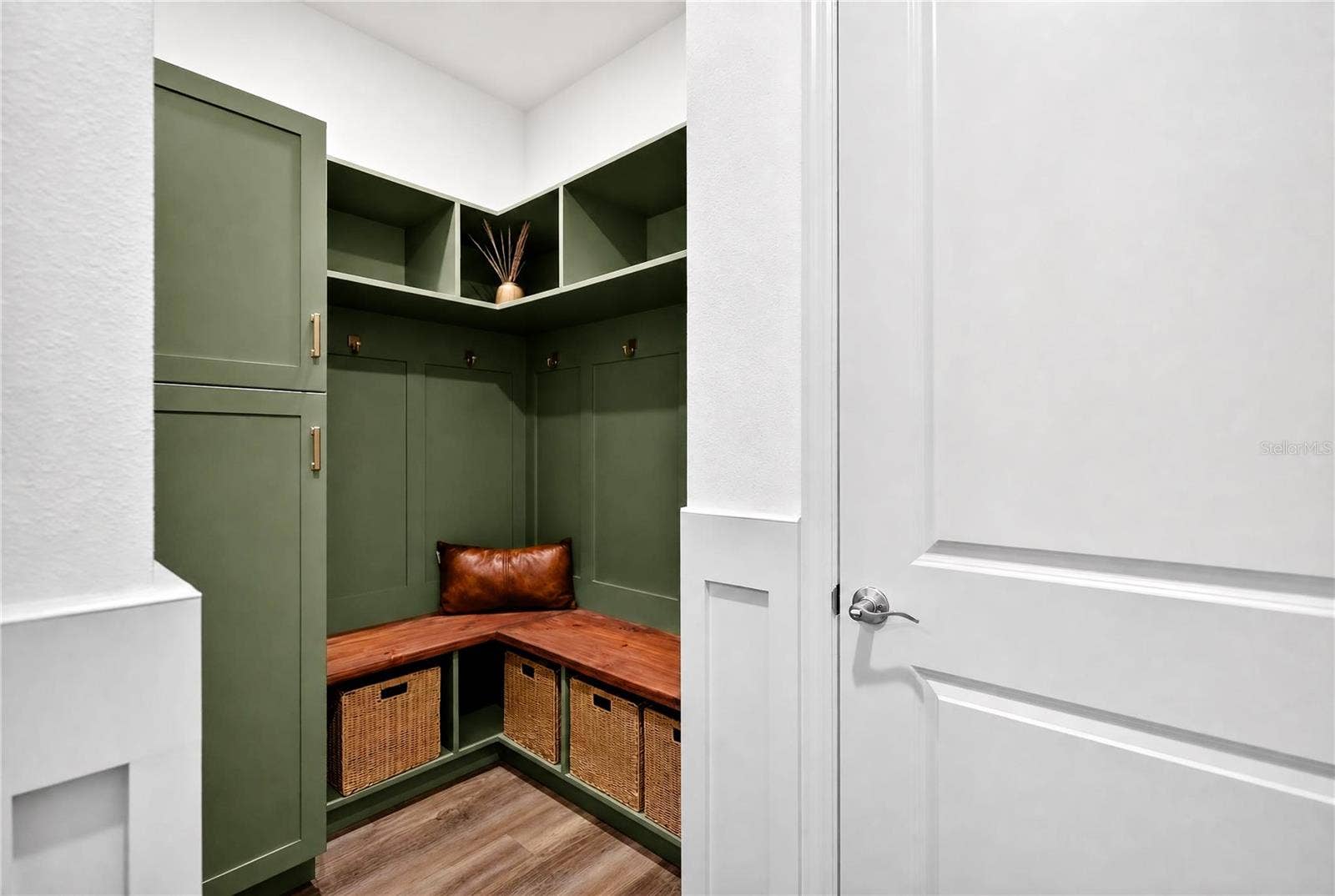 Entryway off garage with built ins
