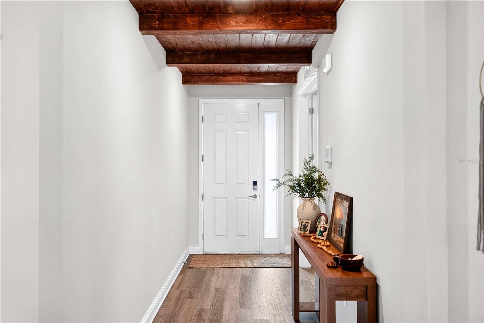 Entryway with finished ceiling