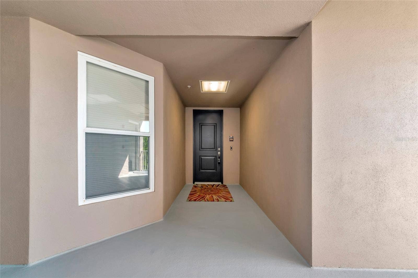 395 ARUBA CIRCLE, #203, Bradenton, FL 34209 Corner unit located on Second Floor