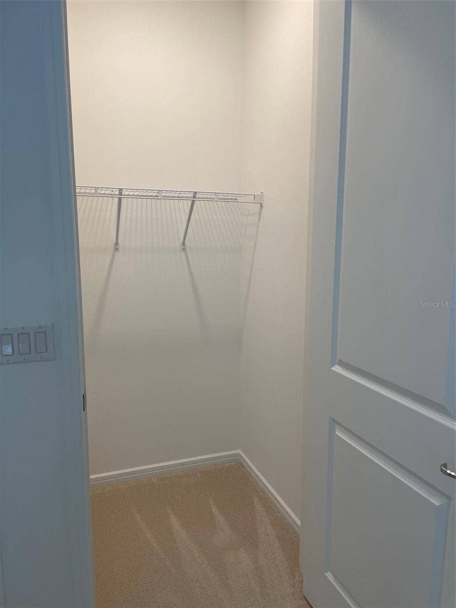 10434 SPRING TIDE WAY, Parrish, FL 34219 Closet in guest bedroom
