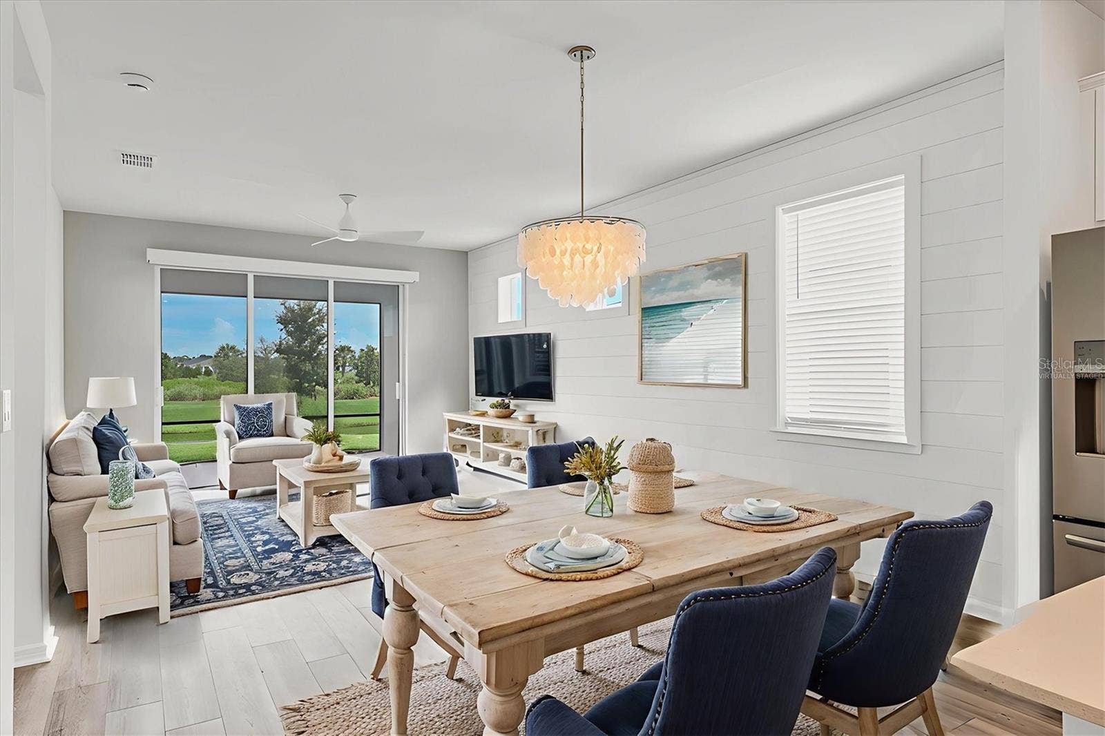 10434 SPRING TIDE WAY, Parrish, FL 34219 Virtually staged living and dining rooms.
