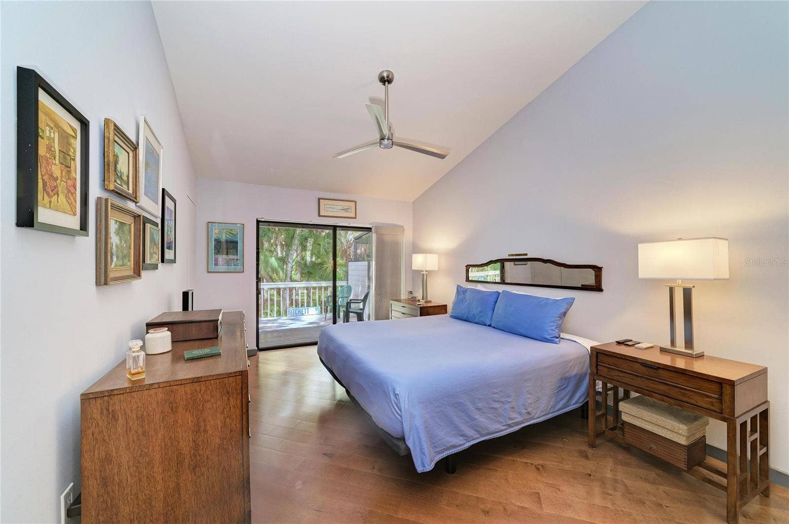2403 ARBORETUM CIRCLE, #29, Sarasota, FL 34232 Primary bedroom with sliders out to the open back deck