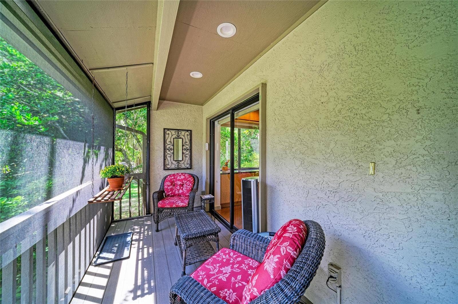 2403 ARBORETUM CIRCLE, #29, Sarasota, FL 34232 Charming screened front porch. Sliders into the kitchen.