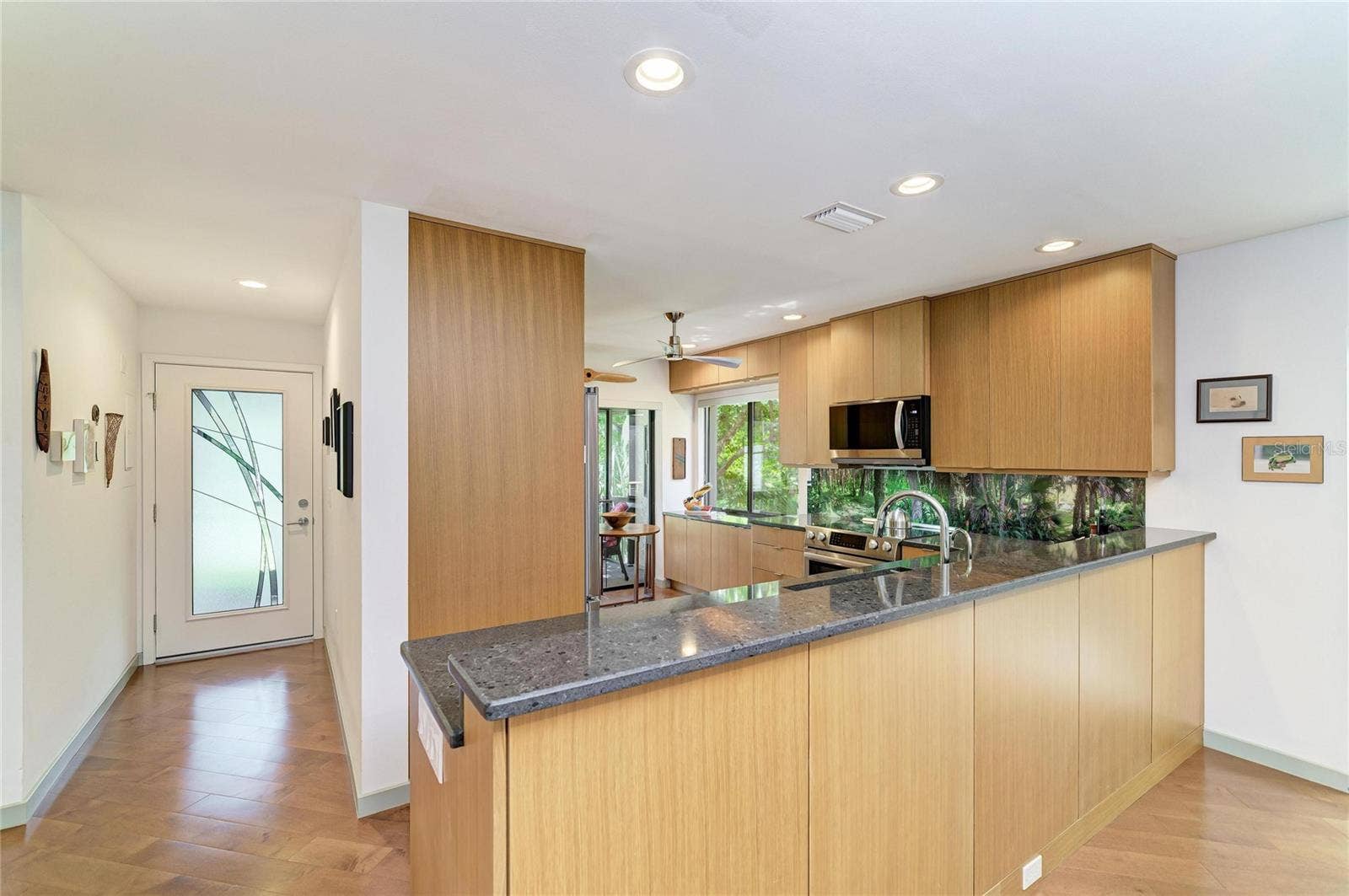 2403 ARBORETUM CIRCLE, #29, Sarasota, FL 34232 Entryway & kitchen