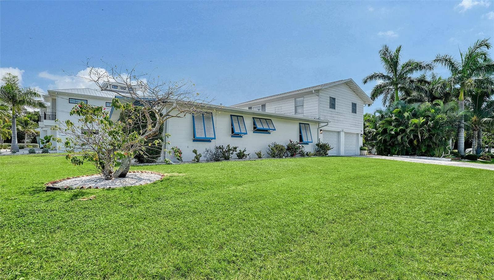 7406 MARINA DRIVE, #A and B, Holmes Beach, FL 34217 side facing 75th St