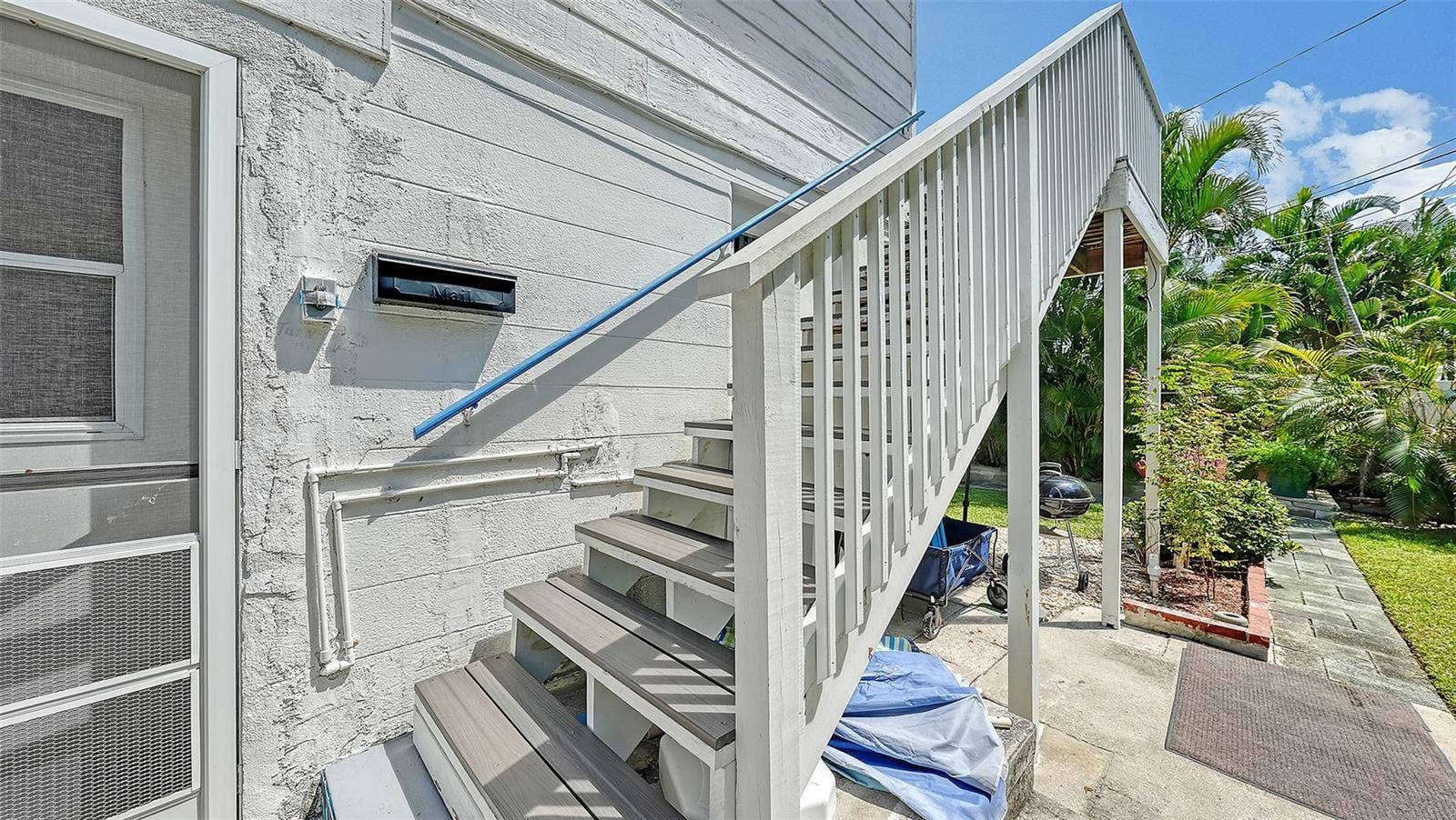 7406 MARINA DRIVE, #A and B, Holmes Beach, FL 34217 Side entrance up the stairs to Apt B