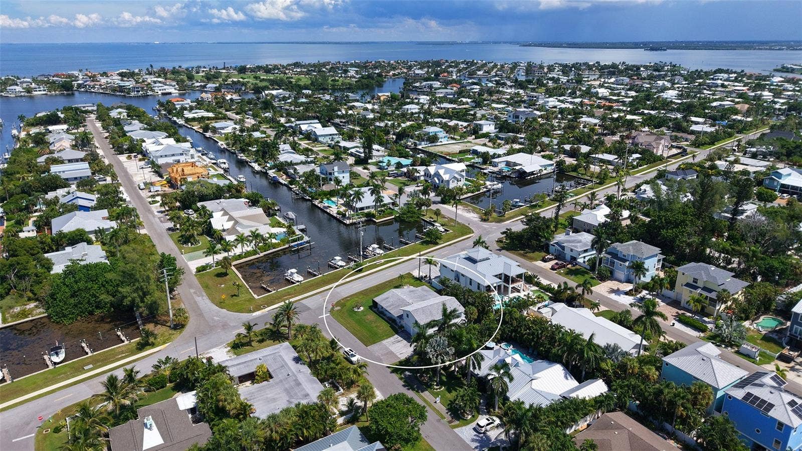 7406 MARINA DRIVE, #A and B, Holmes Beach, FL 34217 Across Marina Drive from canal