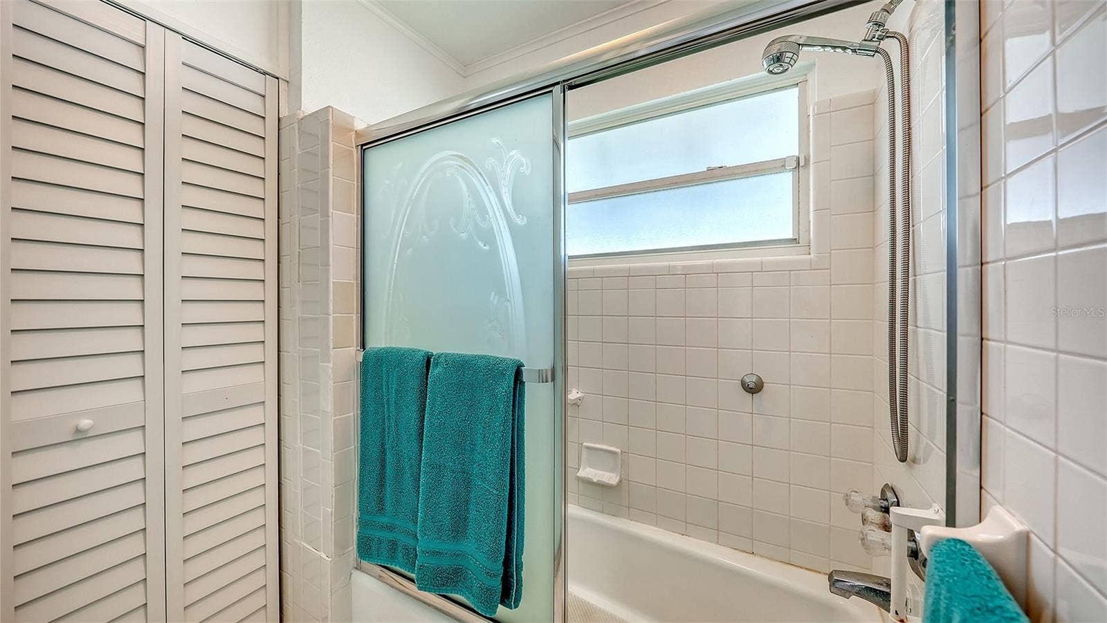 7406 MARINA DRIVE, #A and B, Holmes Beach, FL 34217 Shower room Apt A