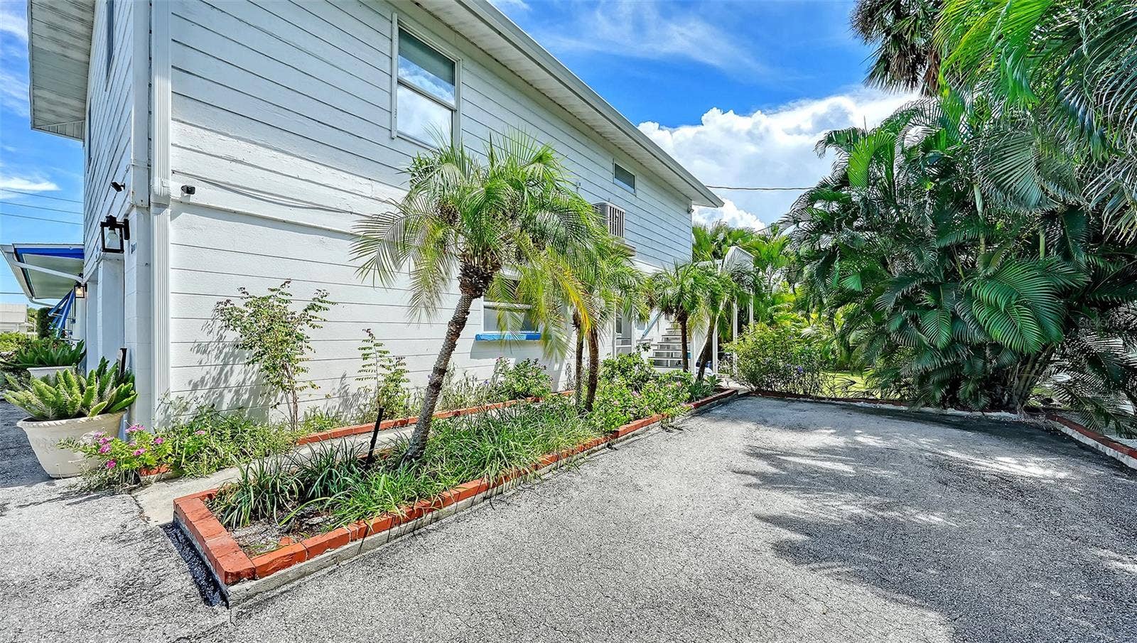 7406 MARINA DRIVE, #A and B, Holmes Beach, FL 34217 uncovered parking for Apt B