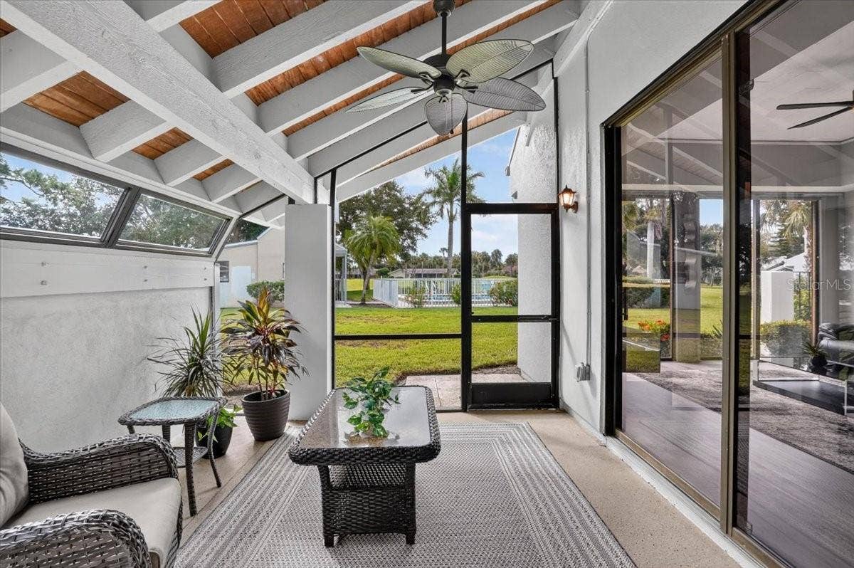 2319 LAKESIDE MEWS, #B3, Sarasota, FL 34235 lanai with sliders from kitchen and living room