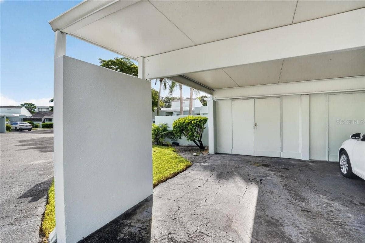 2319 LAKESIDE MEWS, #B3, Sarasota, FL 34235 covered parking and storage closet