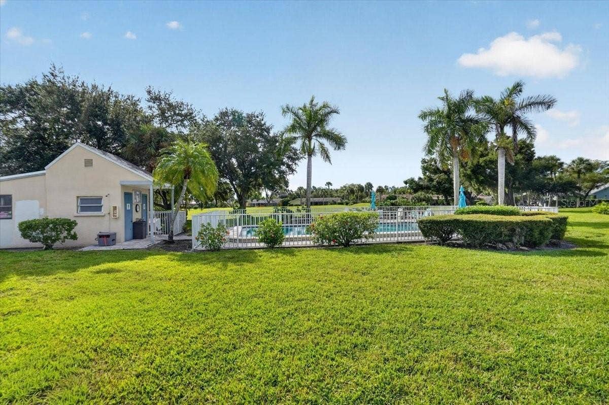 2319 LAKESIDE MEWS, #B3, Sarasota, FL 34235 pool view from the living room