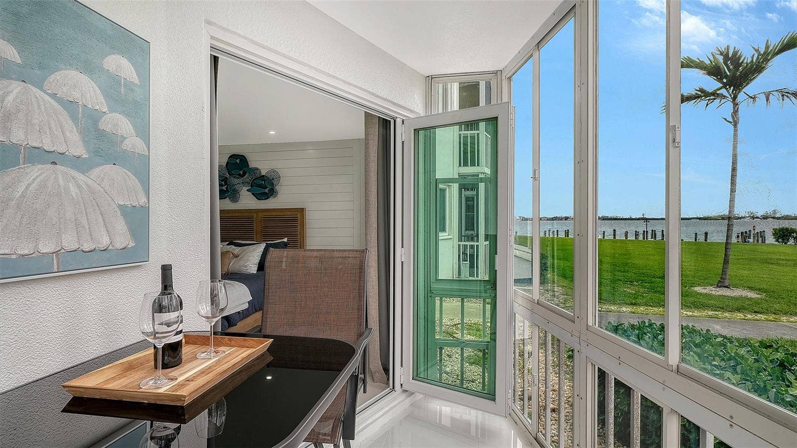 Bi-fold high impact sliding glass doors.