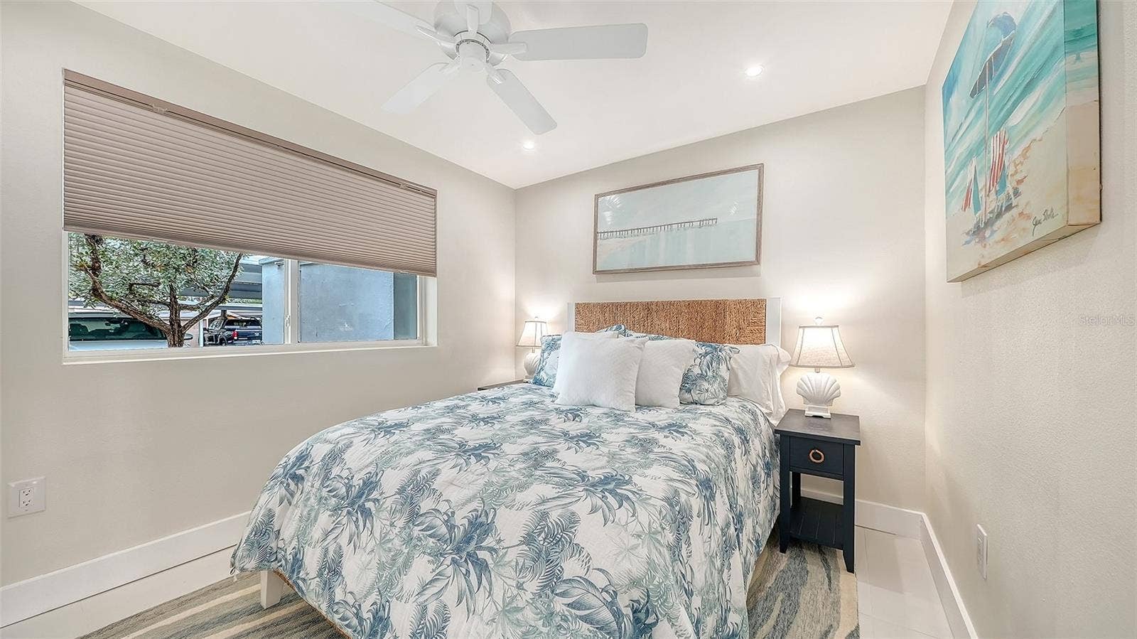 Guest bedroom with California built in closets.