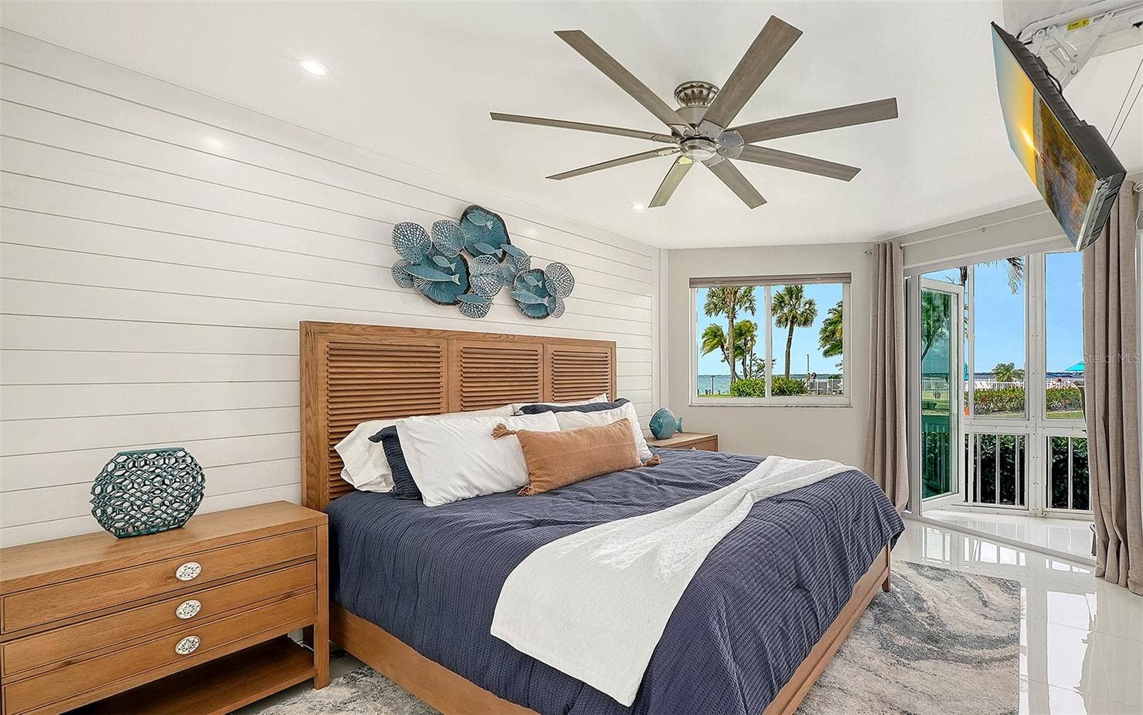 Primary bedroom with custom built in closets.