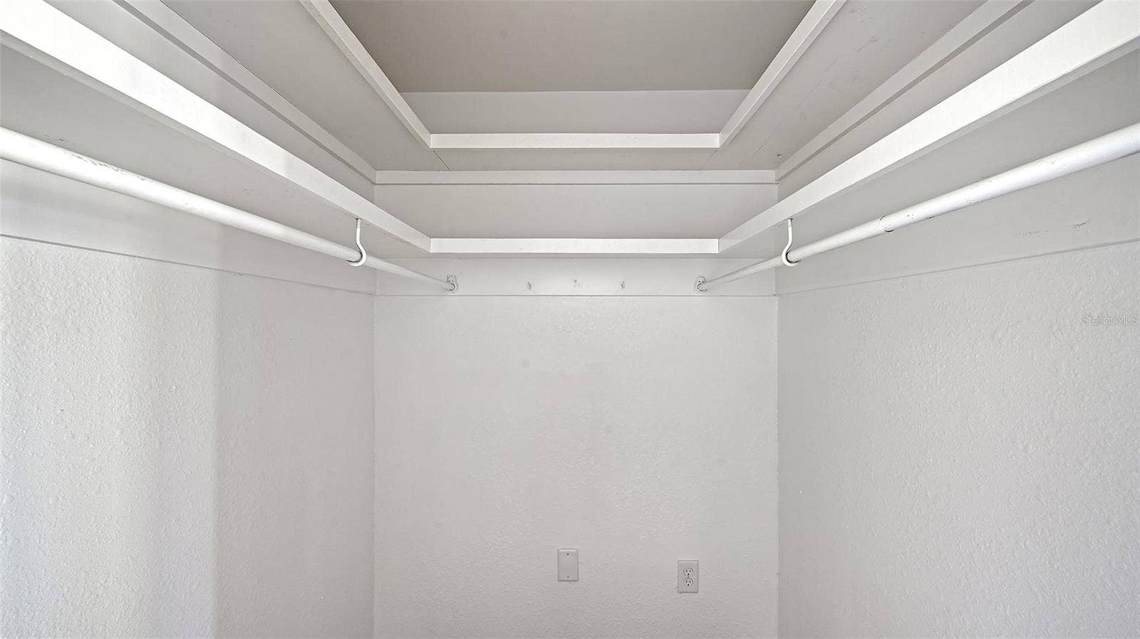Primary Bedroom (bedroom one) walk-in closet.