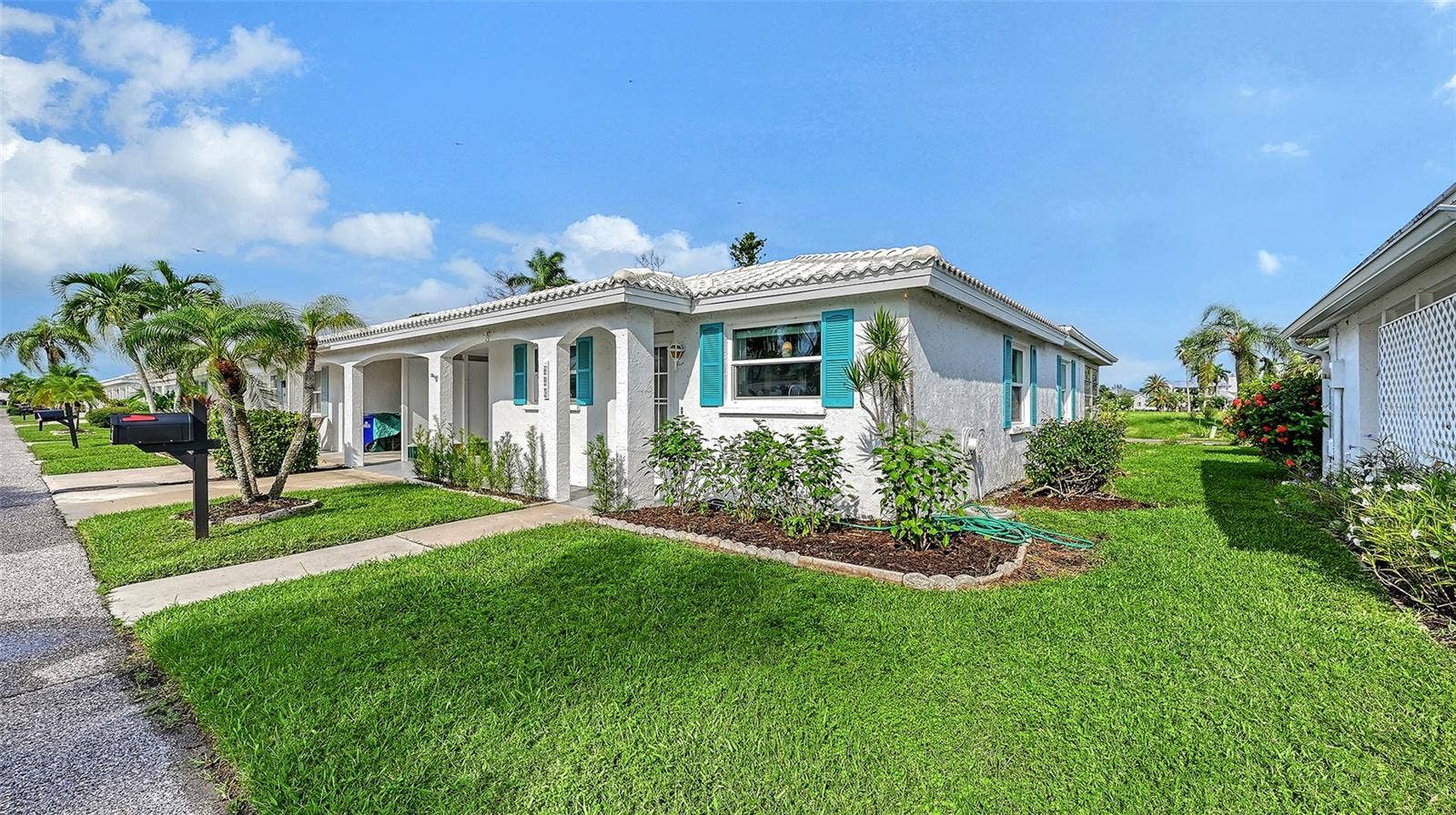 This villa is attached at the carports and is an end unit.