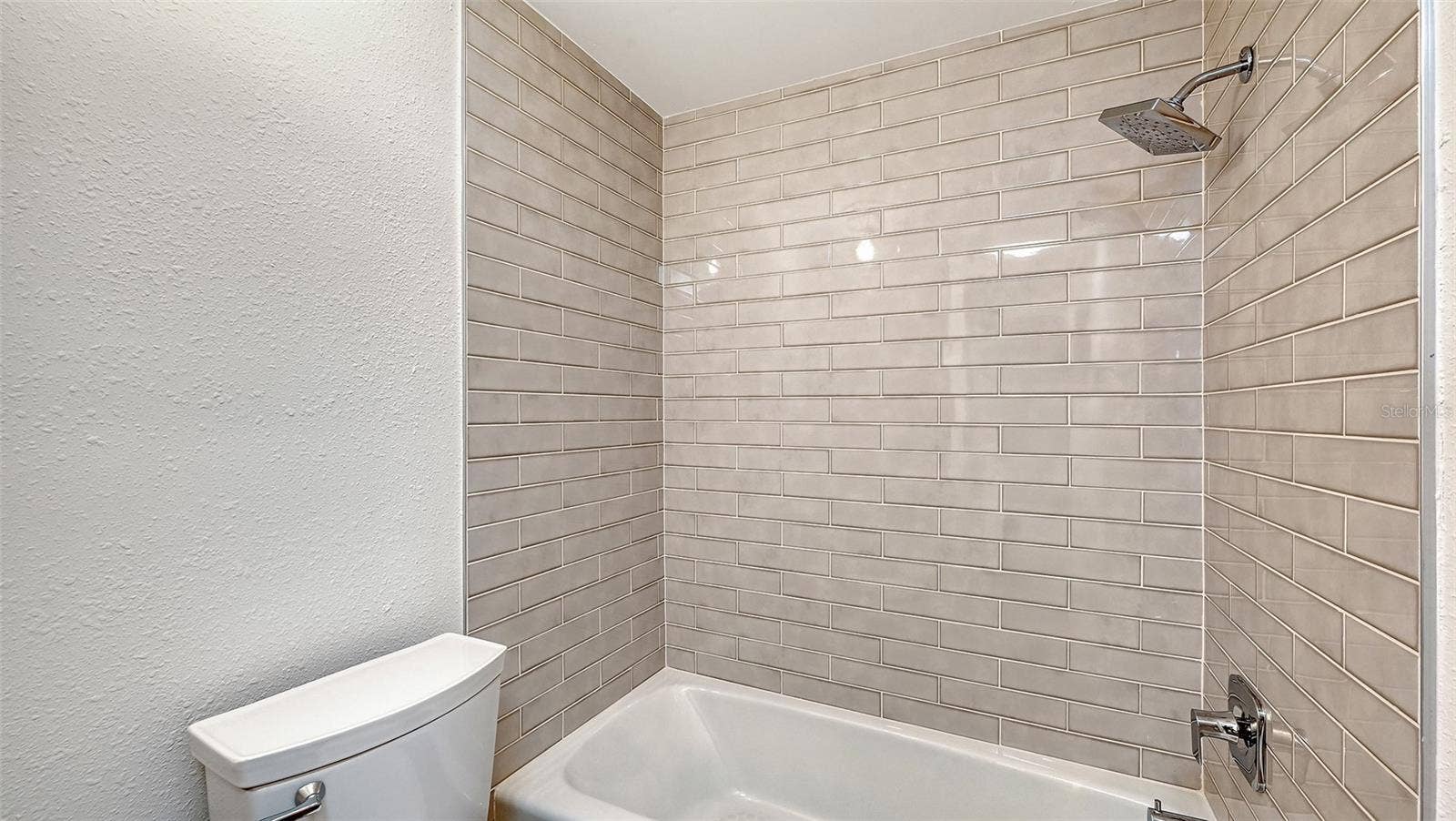Guest Bathroom with tub/shower combination.